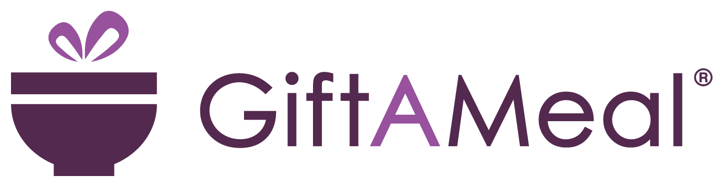GiftAMeal logo over a restaurant table photo